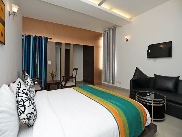 Imagen de la habitación del Hotel Oyo 11872 Heaven Inn. Foto 15