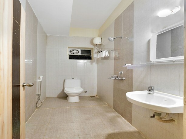 Imagen de la habitación del Hotel Oyo 11919 Dock Inn. Foto 9