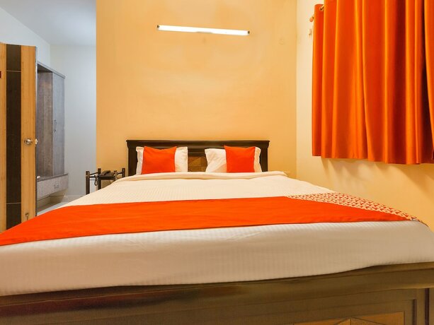 Imagen de la habitación del Hotel Oyo 11919 Dock Inn. Foto 11