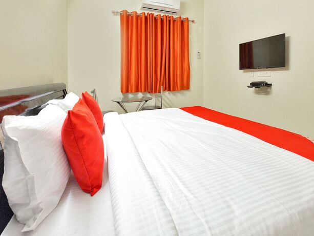 Imagen de la habitación del Hotel Oyo 11919 Dock Inn. Foto 12