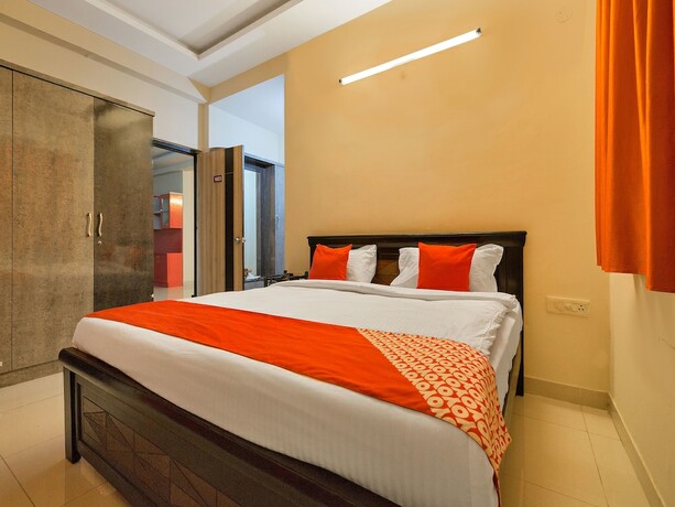 Imagen de la habitación del Hotel Oyo 11919 Dock Inn. Foto 17