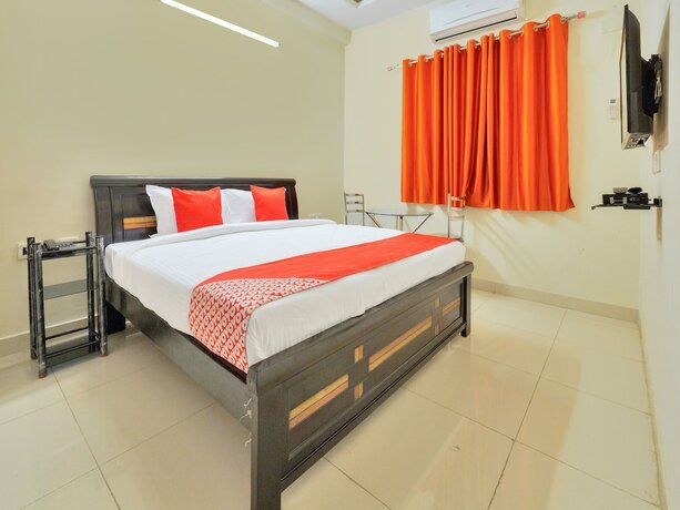 Imagen de la habitación del Hotel Oyo 11919 Dock Inn. Foto 19