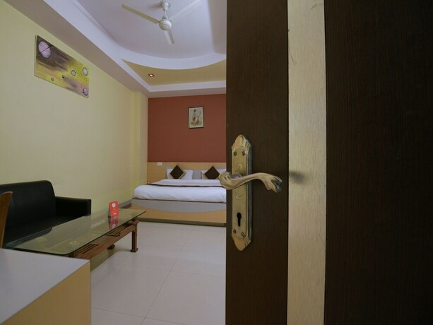 Imagen de la habitación del Hotel Oyo 11923 Rajdhani Palace. Foto 11