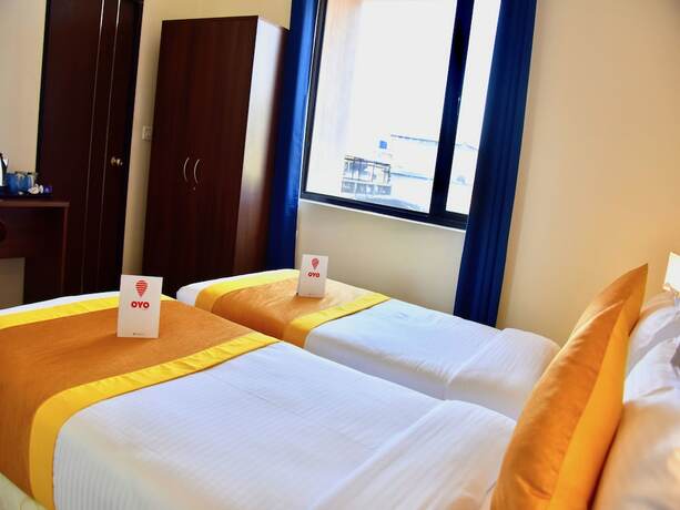 Imagen de la habitación del Hotel Oyo 11950 Relax Holiday Home. Foto 7