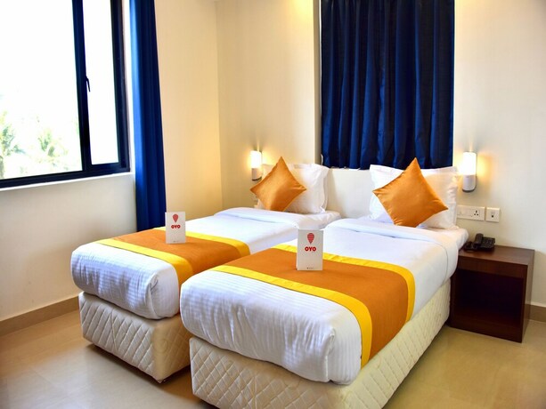 Imagen de la habitación del Hotel Oyo 11950 Relax Holiday Home. Foto 13