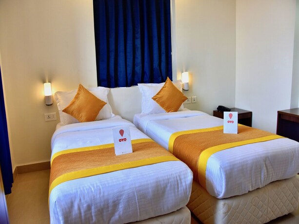 Imagen de la habitación del Hotel Oyo 11950 Relax Holiday Home. Foto 16