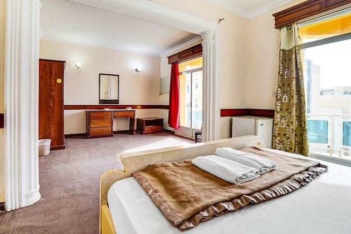 Imagen de la habitación del Hotel Oyo 120 Concord International. Foto 4