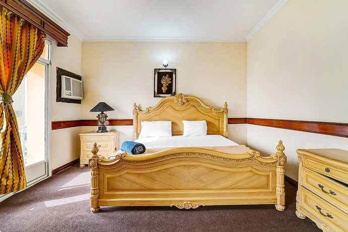 Imagen de la habitación del Hotel Oyo 120 Concord International. Foto 6