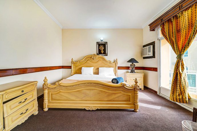 Imagen de la habitación del Hotel Oyo 120 Concord International. Foto 7