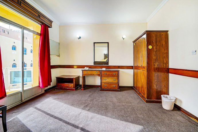 Imagen de la habitación del Hotel Oyo 120 Concord International. Foto 9