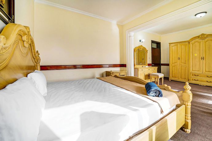 Imagen de la habitación del Hotel Oyo 120 Concord International. Foto 11