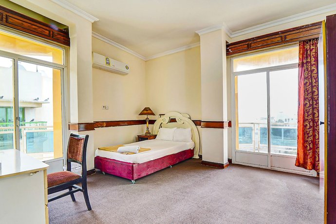 Imagen de la habitación del Hotel Oyo 120 Concord International. Foto 13