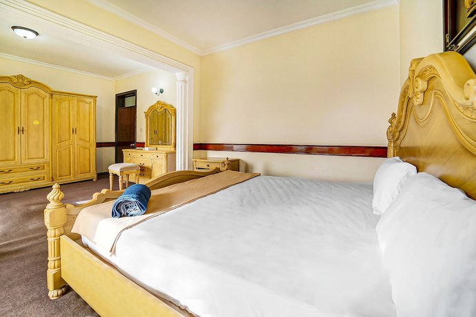 Imagen de la habitación del Hotel Oyo 120 Concord International. Foto 14