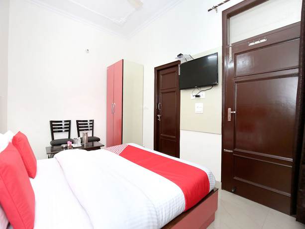 Imagen de la habitación del Hotel Oyo 12025 Kamal Palace. Foto 11