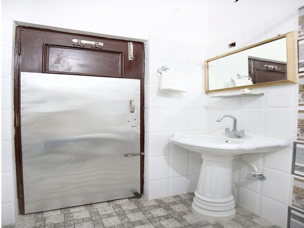 Imagen de la habitación del Hotel Oyo 12025 Kamal Palace. Foto 18
