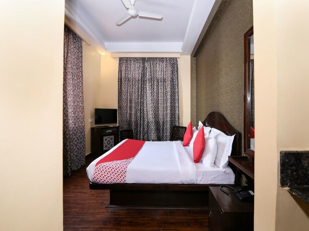 Imagen de la habitación del Hotel Oyo 12086 Panchsheel. Foto 11