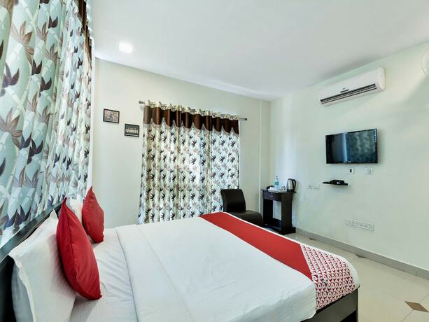 Imagen de la habitación del Hotel Oyo 12120 Srico. Foto 12