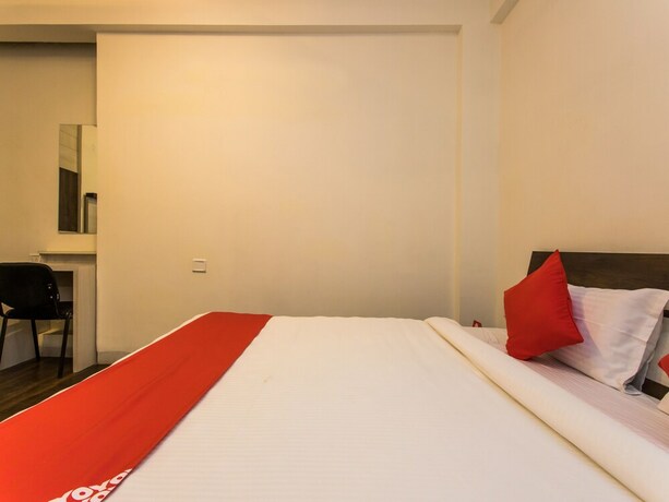 Imagen de la habitación del Hotel Oyo 12362 Emerald Park. Foto 8