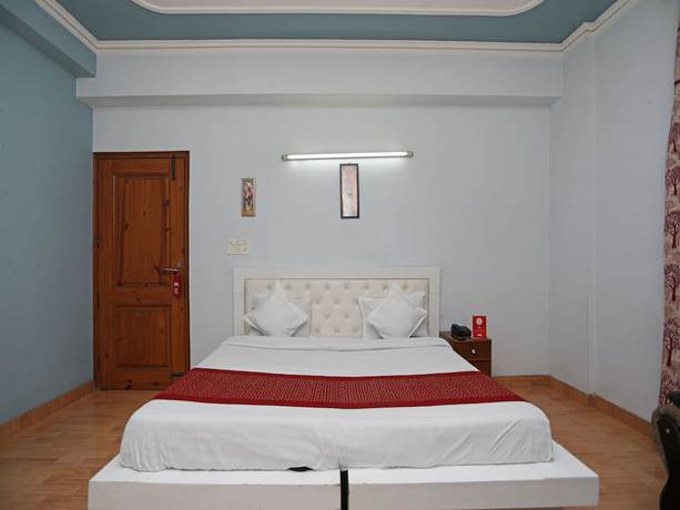 Imagen de la habitación del Hotel Oyo 12502 City. Foto 11