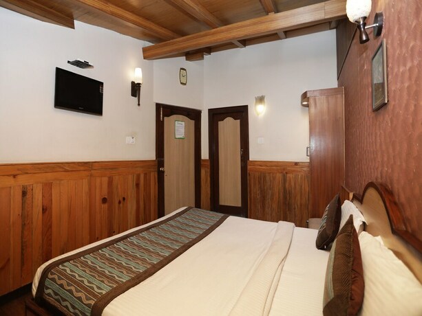 Imagen de la habitación del Hotel Oyo 12721 Vansh Regency. Foto 25