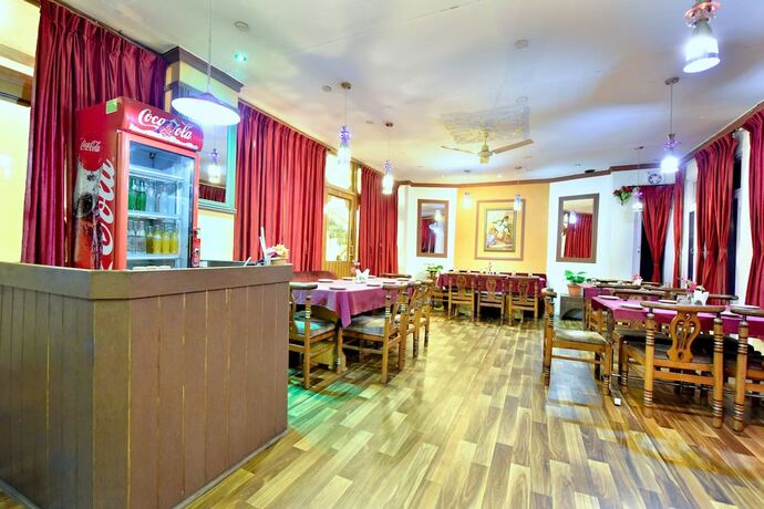Imagen del bar/restaurante del Hotel Oyo 12740 Amandeep. Foto 16