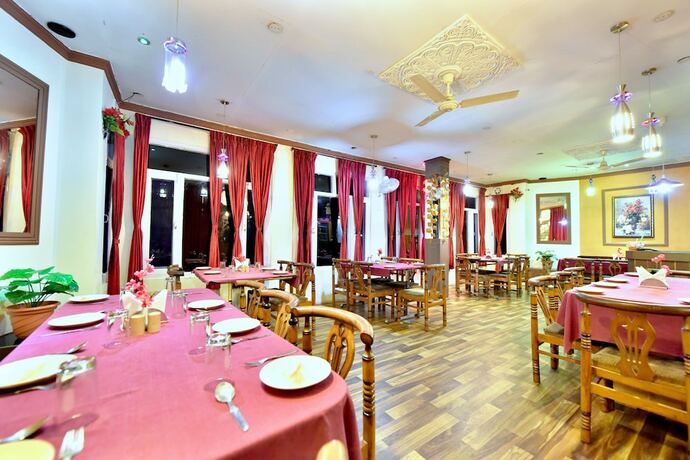 Imagen del bar/restaurante del Hotel Oyo 12740 Amandeep. Foto 18