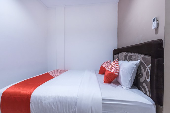 Imagen de la habitación del Hotel Oyo 1310 Urban Residence. Foto 6