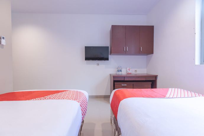 Imagen de la habitación del Hotel Oyo 1310 Urban Residence. Foto 9