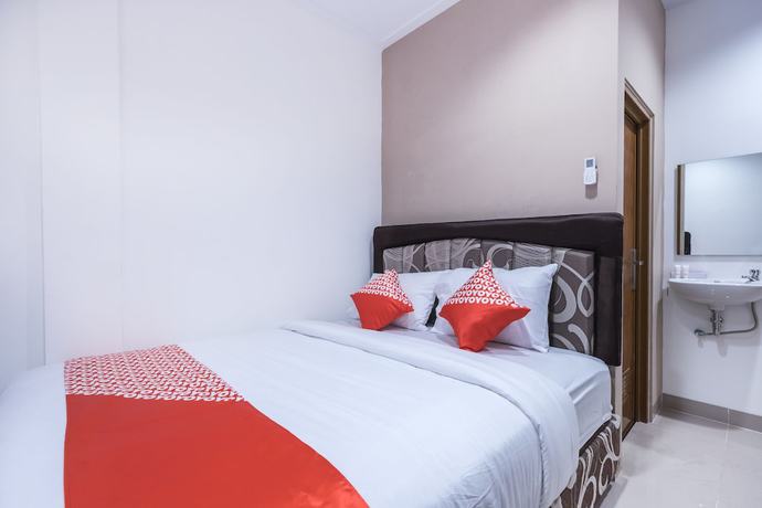 Imagen de la habitación del Hotel Oyo 1310 Urban Residence. Foto 11