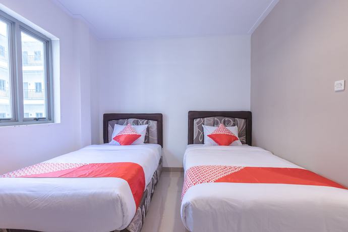 Imagen de la habitación del Hotel Oyo 1310 Urban Residence. Foto 12