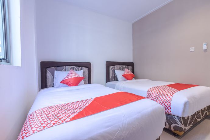 Imagen de la habitación del Hotel Oyo 1310 Urban Residence. Foto 17