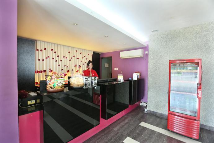 Imagen de los interiores del Hotel Oyo 136 Manggis Inn. Foto 14