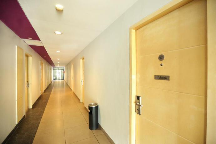 Imagen de los interiores del Hotel Oyo 136 Manggis Inn. Foto 16