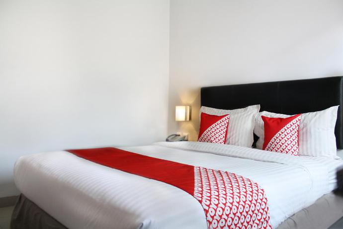 Imagen de la habitación del Hotel Oyo 136 Manggis Inn. Foto 10