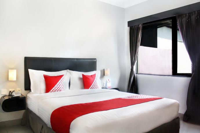 Imagen de la habitación del Hotel Oyo 136 Manggis Inn. Foto 11