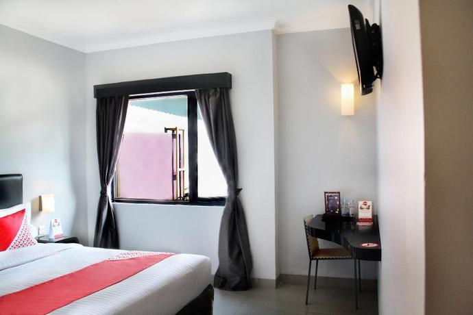 Imagen de la habitación del Hotel Oyo 136 Manggis Inn. Foto 12