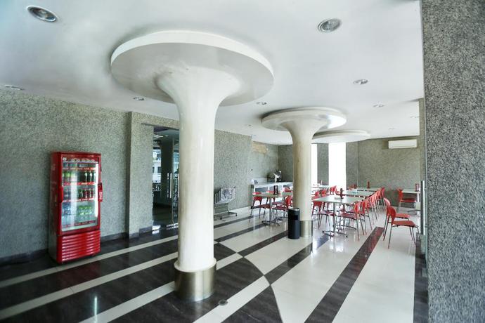 Imagen del bar/restaurante del Hotel Oyo 136 Manggis Inn. Foto 9