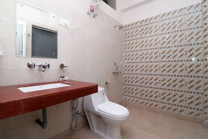 Imagen de la habitación del Hotel Oyo 13655 Benog Breeze. Foto 10