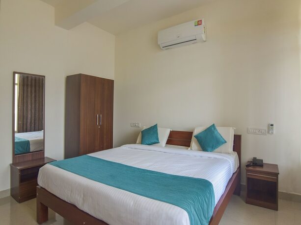 Imagen de la habitación del Hotel Oyo 14144 Moriz Madikeri. Foto 2