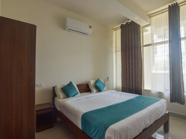 Imagen de la habitación del Hotel Oyo 14144 Moriz Madikeri. Foto 3