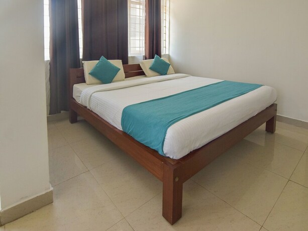 Imagen de la habitación del Hotel Oyo 14144 Moriz Madikeri. Foto 4