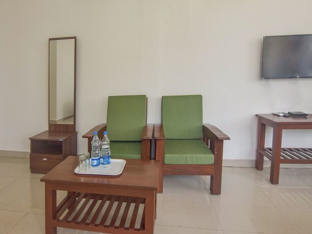 Imagen de la habitación del Hotel Oyo 14144 Moriz Madikeri. Foto 6