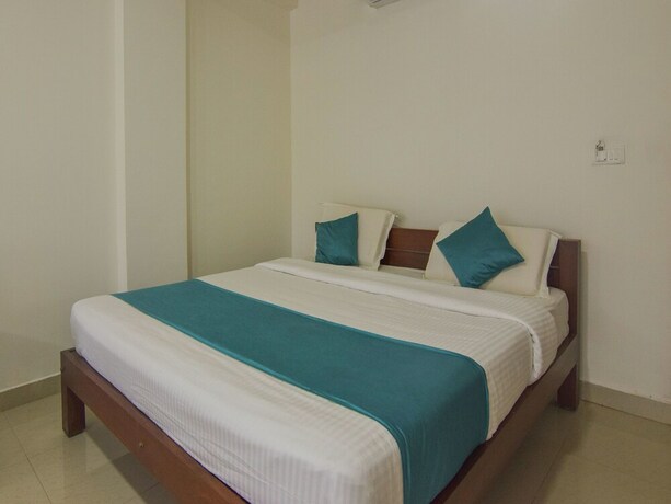 Imagen de la habitación del Hotel Oyo 14144 Moriz Madikeri. Foto 12