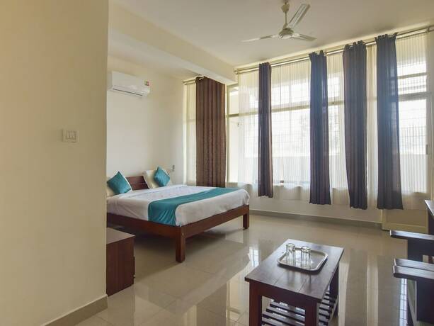 Imagen de la habitación del Hotel Oyo 14144 Moriz Madikeri. Foto 13