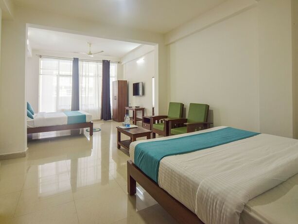 Imagen de la habitación del Hotel Oyo 14144 Moriz Madikeri. Foto 17