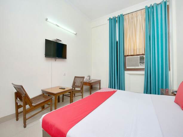 Imagen de la habitación del Hotel Oyo 14324 Towns Pride. Foto 20