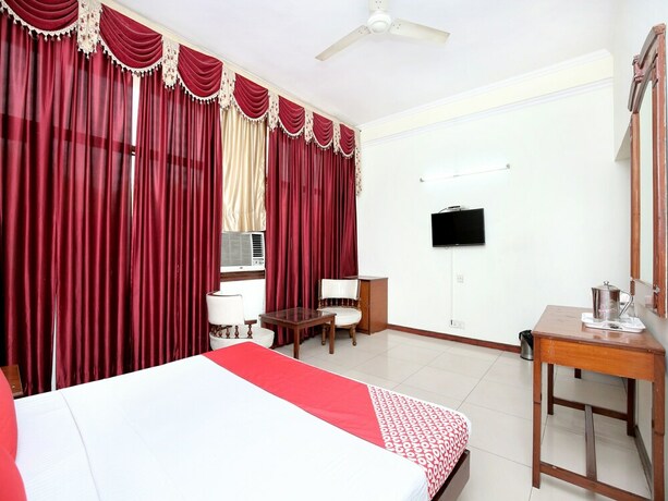Imagen de la habitación del Hotel Oyo 14324 Towns Pride. Foto 22