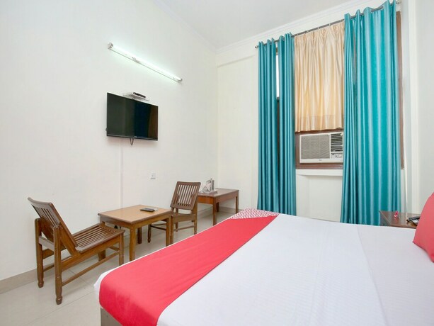Imagen de la habitación del Hotel Oyo 14324 Towns Pride. Foto 27