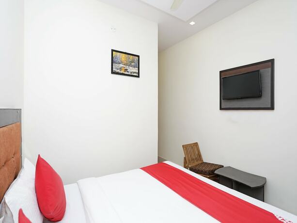 Imagen de la habitación del Hotel Oyo 14468 Divine Ganges. Foto 2