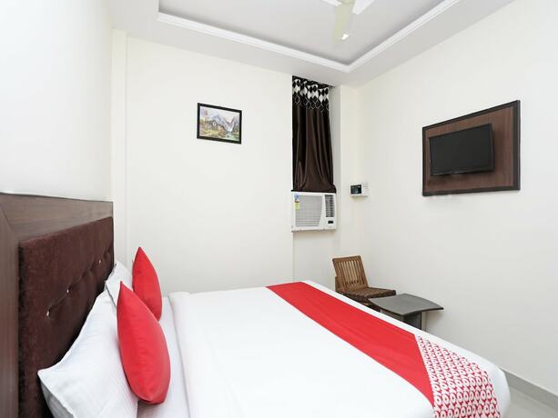 Imagen de la habitación del Hotel Oyo 14468 Divine Ganges. Foto 4